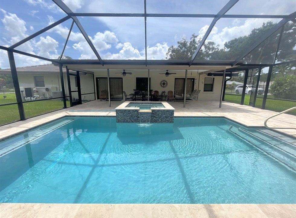 Screened pool with spa