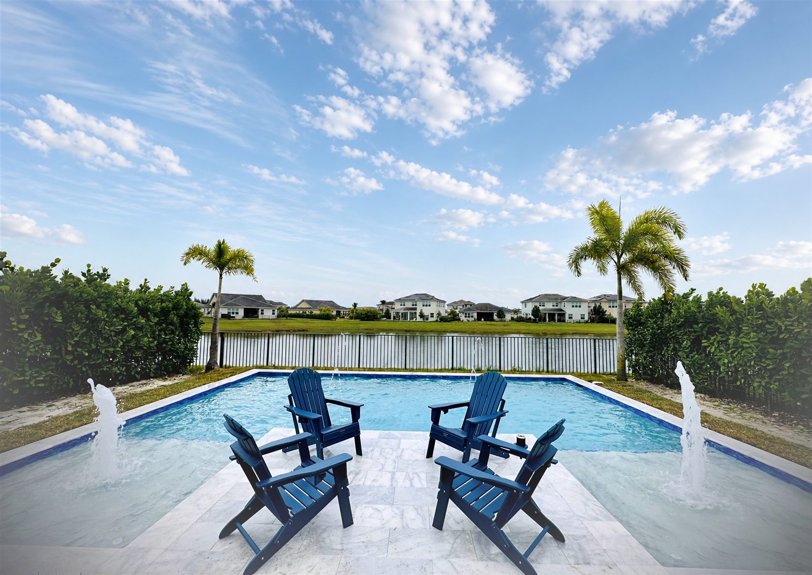 Compact backyard pool overlooking a lake
