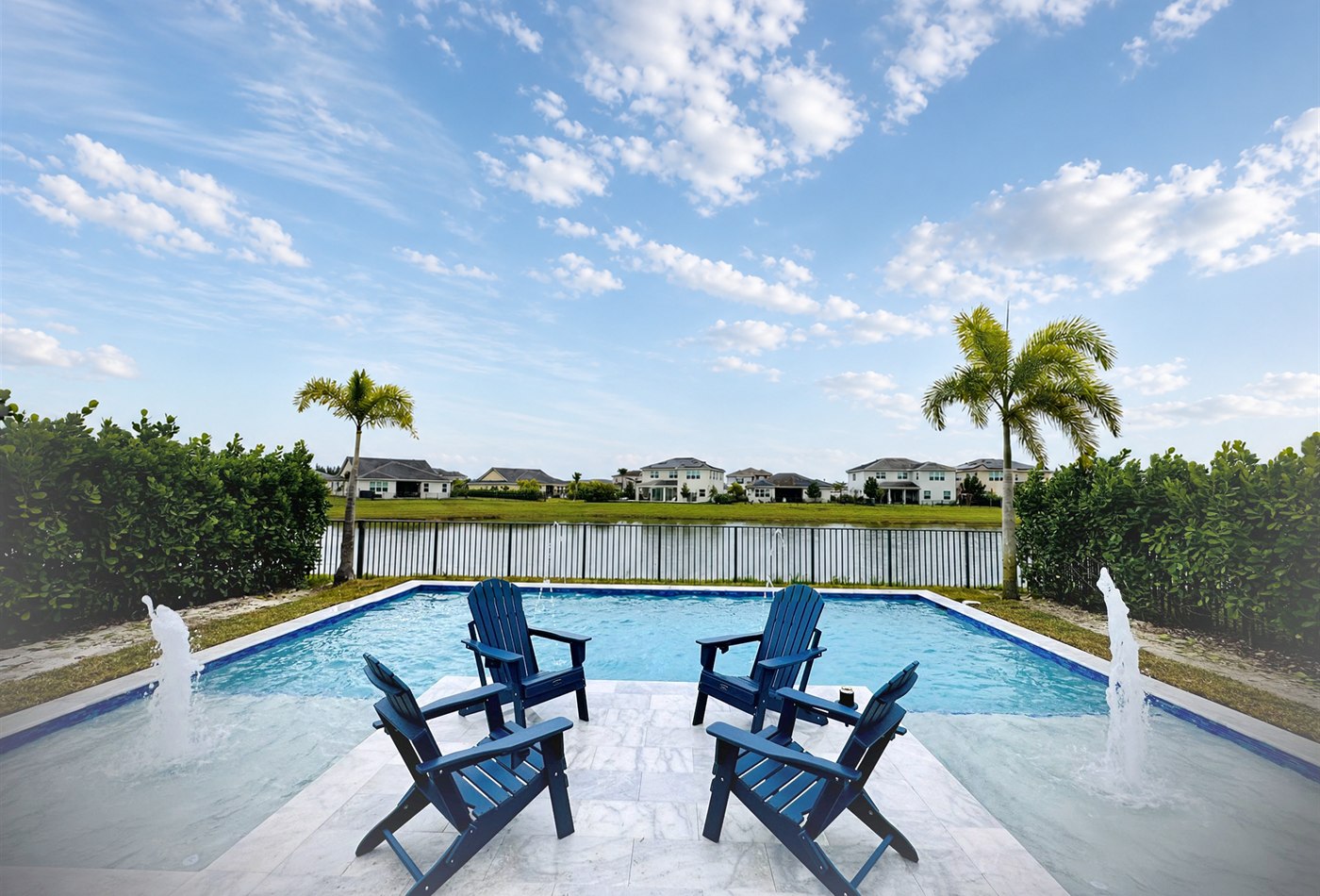 Budget friendly backyard pool overlooking a lake